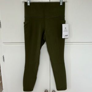 Athleta Salutation Stash Pocket II 7/8 Tight in Green